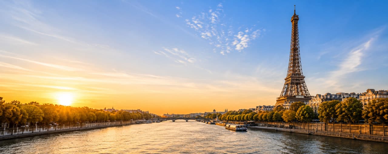 Paris, Seine river and Eiffel Tower at sunset